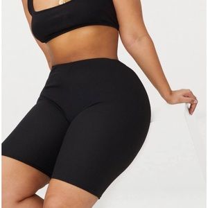Curve black ribbed biker shorts by Missguided